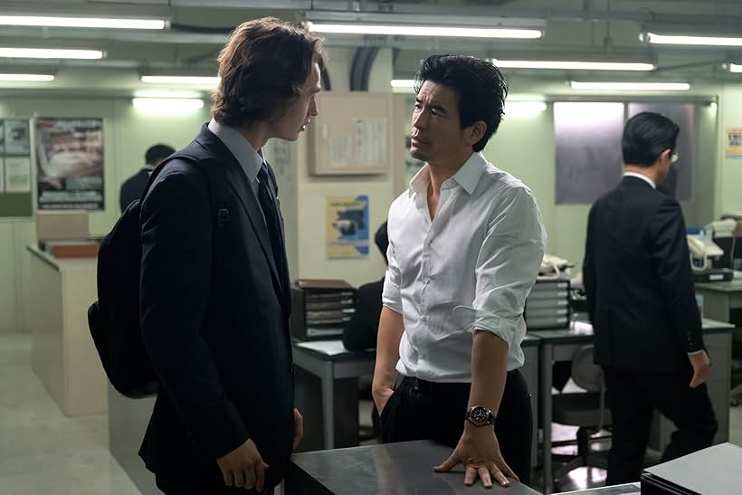 Hideaki Itô and Ansel Elgort in The Information Business (2022)