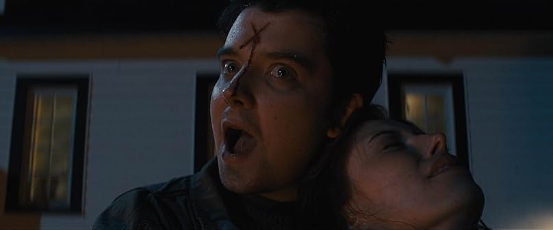Asa Butterfield and Sydney Sabiston in All Fun and Games (2023)