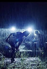 Primary photo for By the Dark of Night