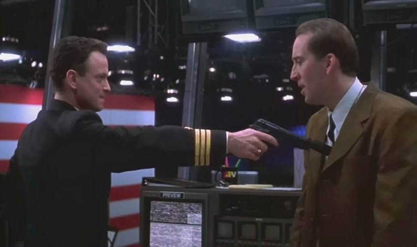 Nicolas Cage and Gary Sinise in Snake Eyes (1998)