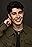 Omid Scobie's primary photo