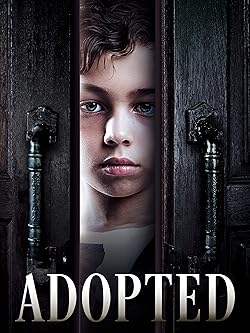 Poster of Adopted