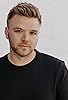 Primary photo for Brett Davern Primary photo for Brett Davern