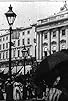 Primary photo for Leisurely Pedestrians, Open Topped Buses and Hansom Cabs with Trotting Horses Primary photo for Leisurely Pedestrians, Open Topped Buses and Hansom Cabs with Trotting Horses