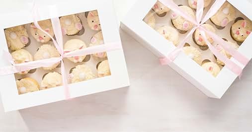 Text reads "Image 1". Two white bakery boxes with clear windows tied with pink ribbons, containing round sugar cookies with pink frosting dots. Boxes positioned on white surface.