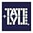 Navy blue square logo design with white text reading 'TATE + LYLE' in a modern, geometric font style within a white frame.