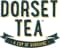 Dorset Tea logo in dark green lettering with yellow outline, featuring banner underneath with text 'A CUP OF SUNSHINE' in gold.