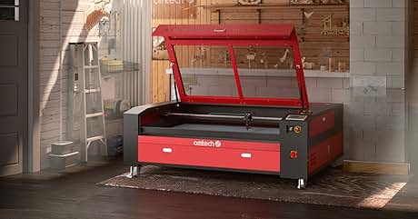 Gran máquina de corte y grabado láser rojo con tapa abierta, colocada en un taller. Cuenta con una espaciosa cama de trabajo y un panel de control.