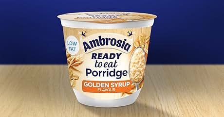 Ambrosia Ready to Eat Porridge in Golden Syrup flavor. Low fat, single-serve cup with product name and oat grain imagery on blue background.