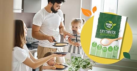 a family of four standing in a kitchen preparing breakfast.