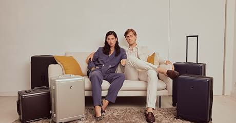 a man and a woman sitting on a couch.