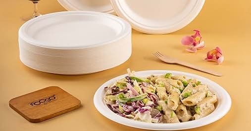 a stack of styrofoam plates and a glass of wine