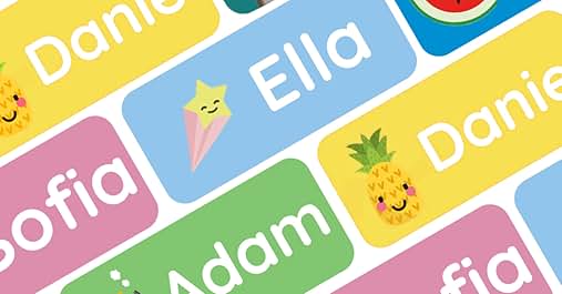 Colorful rectangular name labels with cartoon images. Various names like Daniel, Liam, Ella, Sofia visible. Includes fruit and animal designs.
