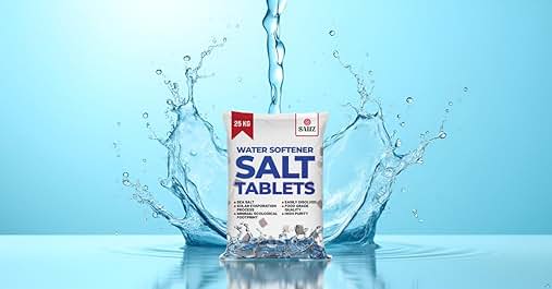 Text reads "WATER SOFTENER SALT TABLETS 25 KG". Package of Lion salt tablets for water softeners against blue background with dynamic water splashes. Clear plastic bag shows white salt crystals inside.