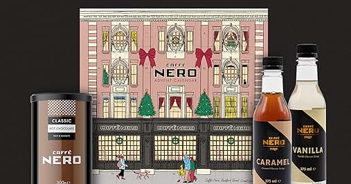 Caffe Nero gifting range featuring holiday-themed storefront illustration. Products include cans, bottles, and gift set in front of decorated facade.
