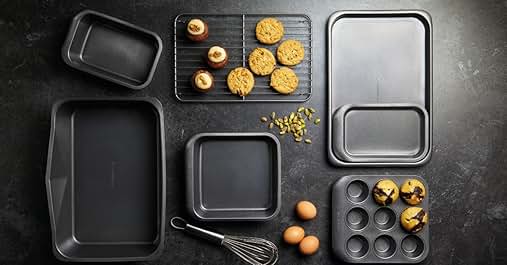the baking trays are made from plastic and are lined with black plastic.