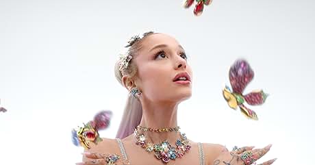 Conjunto de joyas con piedras preciosas coloridas que incluye collar, aretes y pulseras. Adornado con elementos en forma de mariposa y