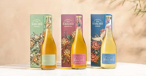 Three bottles of Sancho wine in different colors: white, pink, and blue. Each bottle has a decorative label with floral designs.