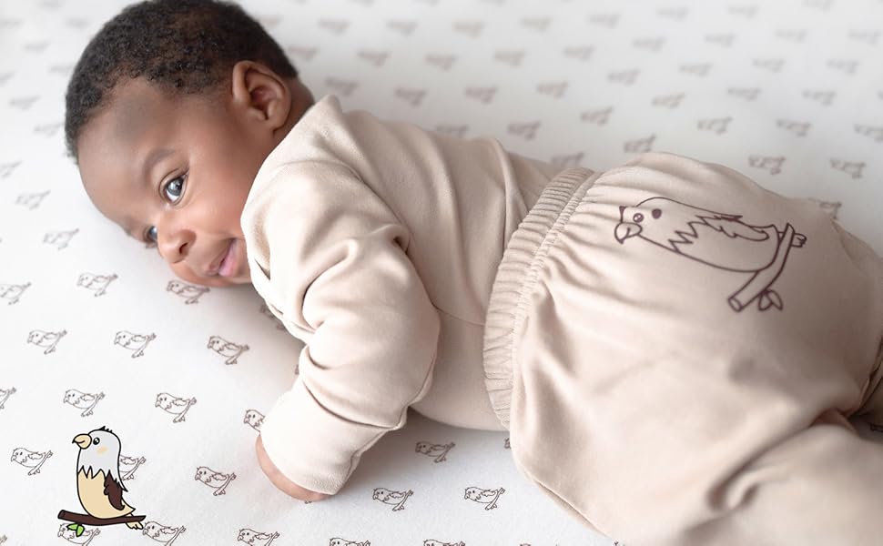 newborn baby in organic clothing