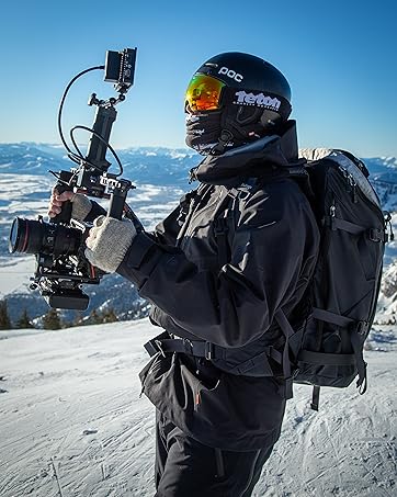 Photographer carrying video rig