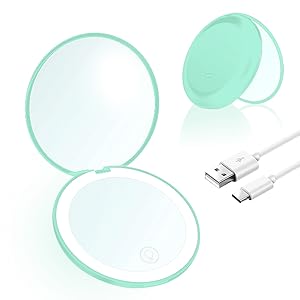 lighted compact mirror with magnification