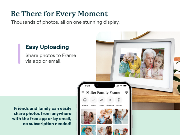 Skylight digital photo frame on table, with hand holding phone.