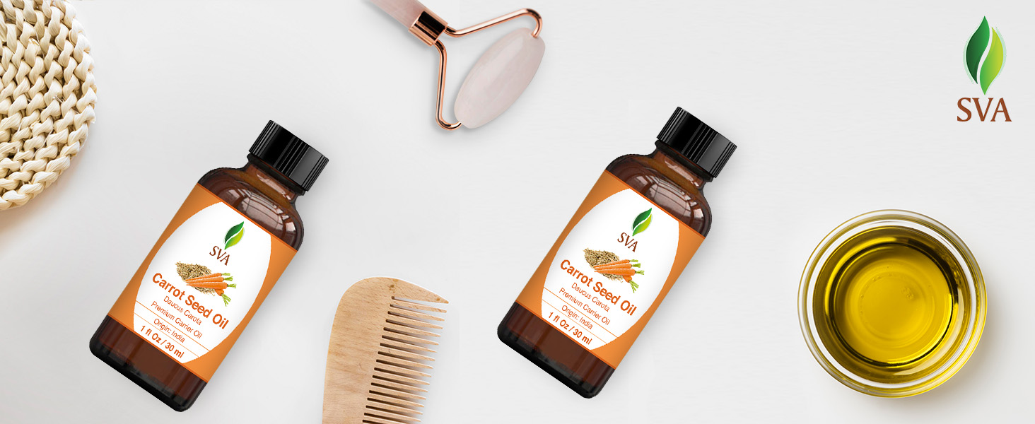 Two amber glass bottle of carrot seed carrier oil with combs and extracted oil