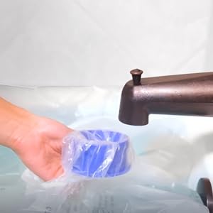 bathtub bladder in tub over faucet