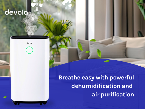 White cylindrical air purifier and dehumidifier. Device features a digital display and is shown in a living room setting.