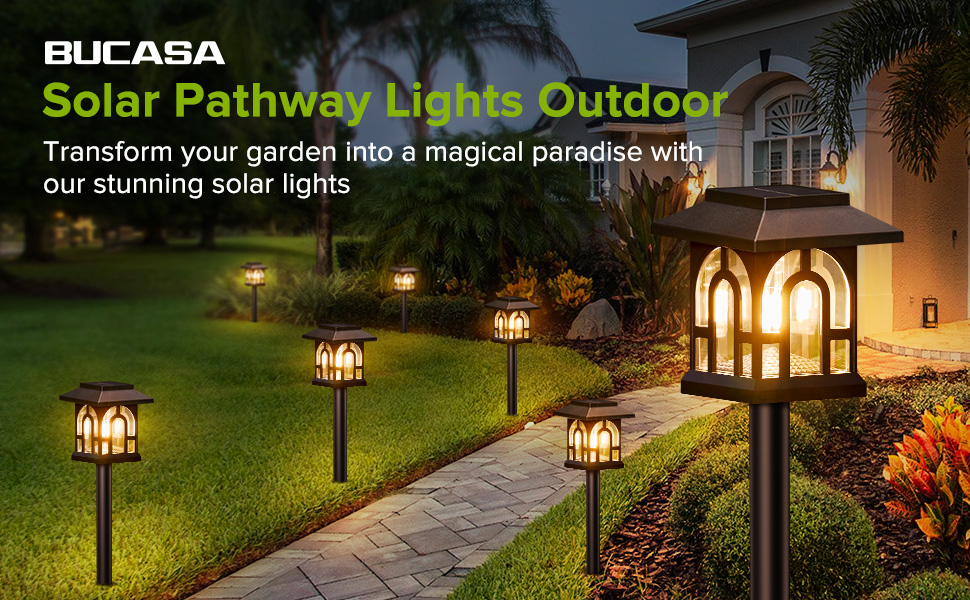 BUCASA para caminos que iluminan la pasarela de un jardín por la noche. Las luces tipo farol colocadas sobre estacas crean un cálido