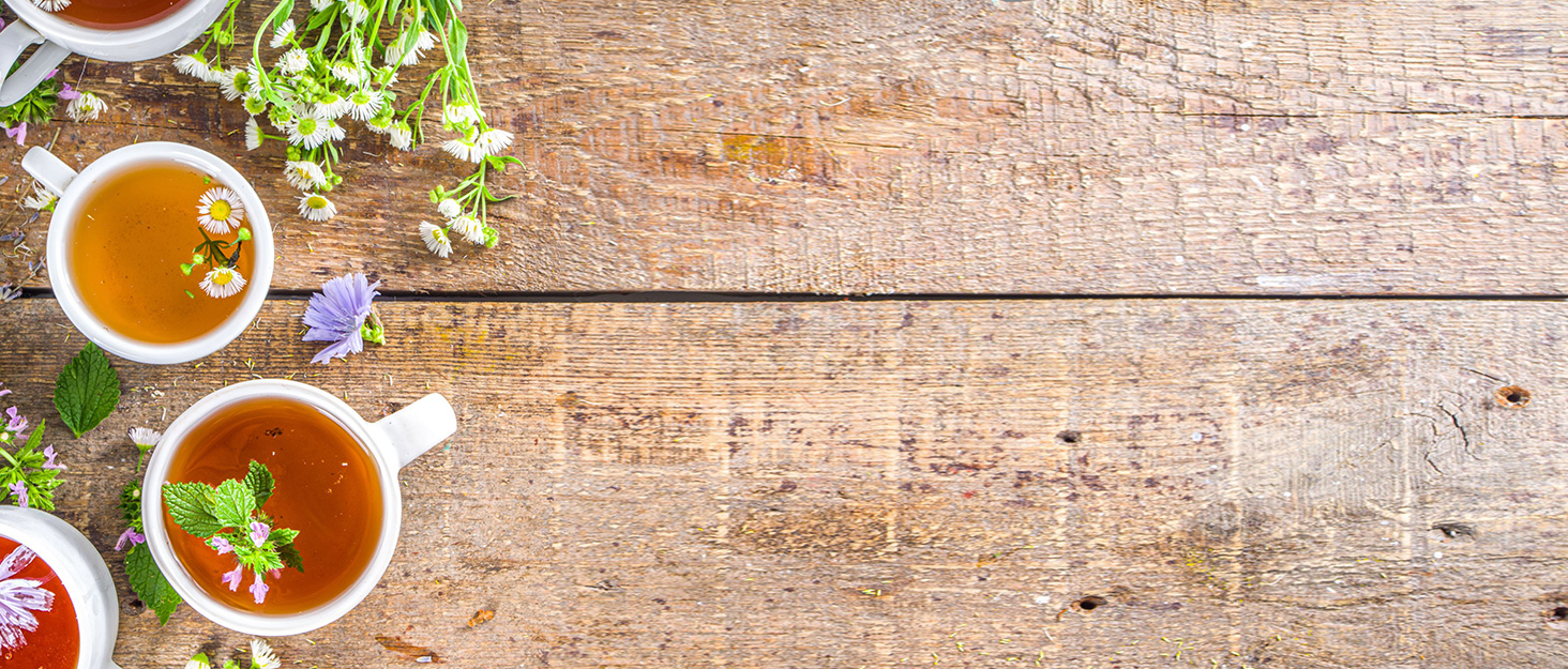 There are some flower teas on the table.