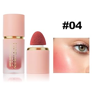 Pink-toned makeup product with gold accents featuring a cylindrical container with sponge applicator and demonstration of blush application effect.
