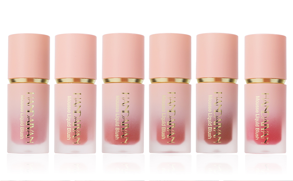 Set of six glass bottles containing liquid lip products in gradient pink to red shades, featuring gold-toned caps and clear product text on bottles.