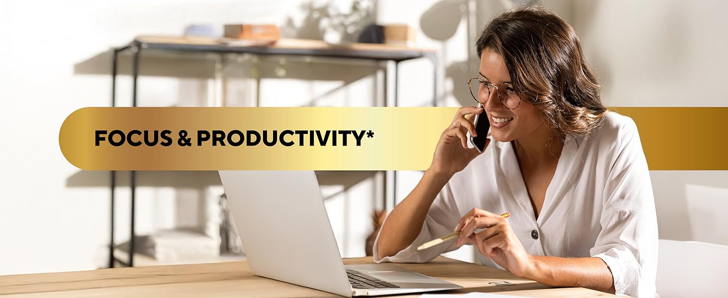 focus and productivity text with woman in white shirt working on laptop 