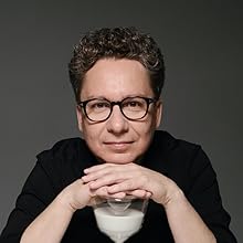 Sergey Young headshot with a white object