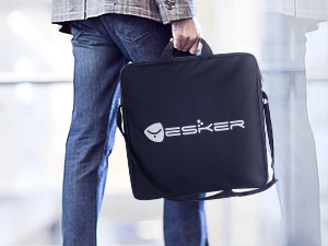 Person carrying the Yesker ring light in its black carrying bag