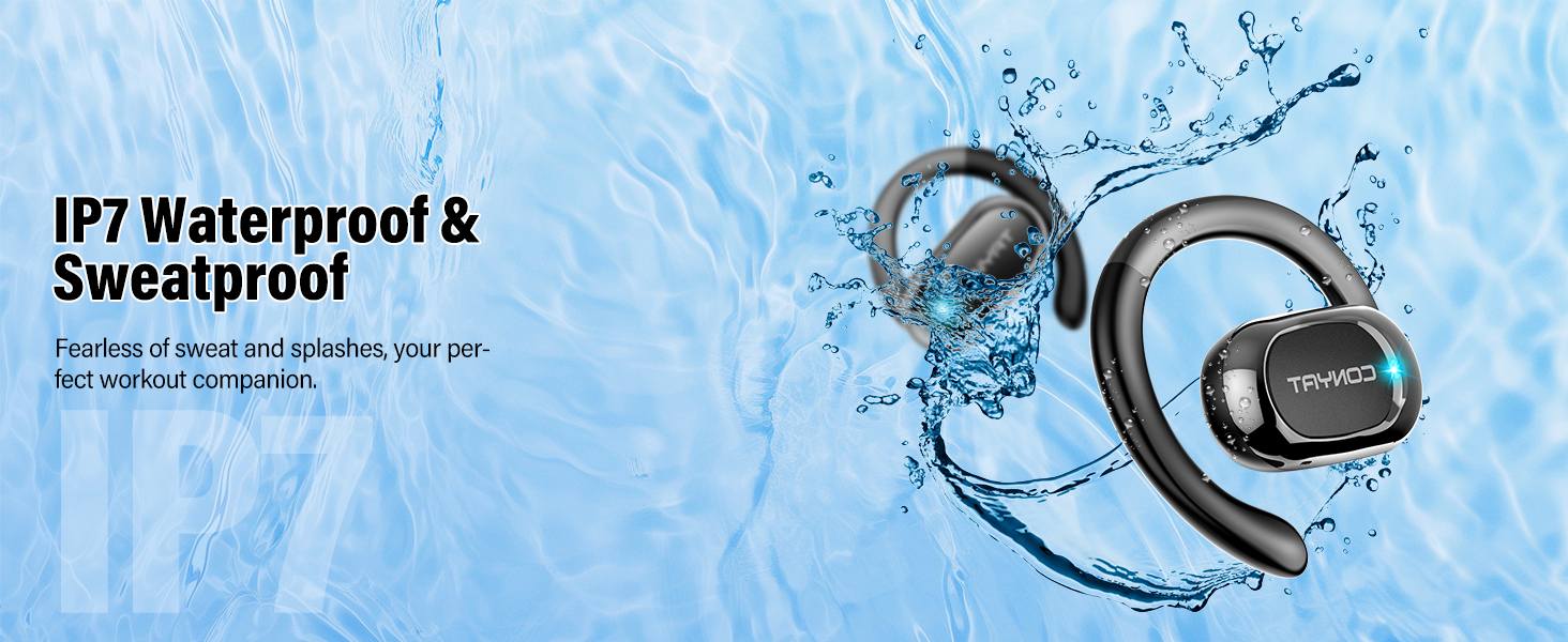 Person holding up a fish, likely a bass, caught while fishing against a blue sky background.