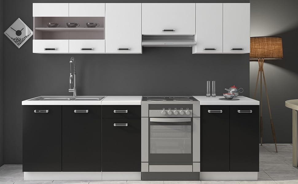 a kitchen with a black and white cabinetry and a white sink.