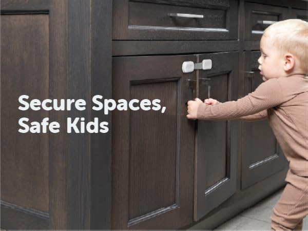 Joolbaby Multi Use Strap keeping child out of a cabinet