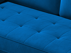 Close-up of a bright blue tufted upholstery fabric featuring a detailed button-style tufted pattern and a plush textile texture