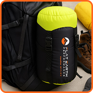 Sleeping bag compression sack attached to a backpack