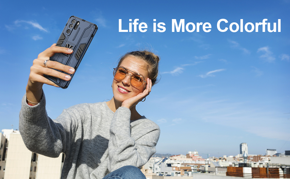 a woman taking a self portrait with a cell phone