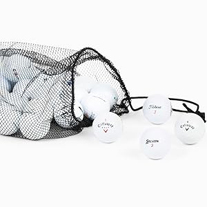mixed golf balls coming out of a black mesh bag