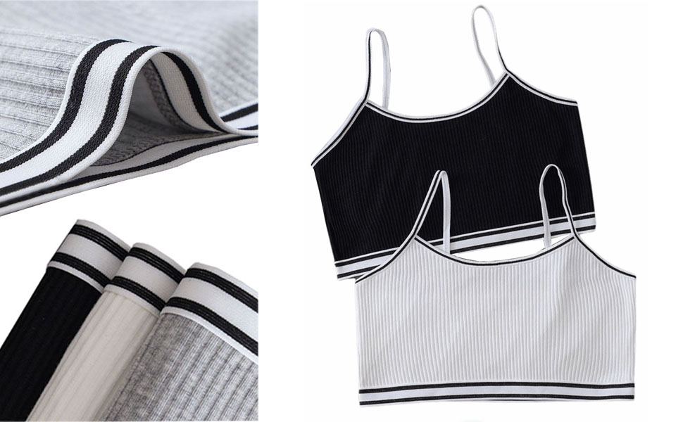 Vêtements de sport à motif rayé noir et blanc, présentant une texture de tissu plié et un haut sans manches avec bordure contrastante.