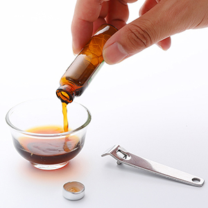 Mini oral liquid opener