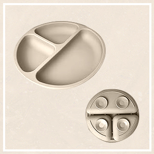 Two circular pill organizers with divided compartments. The larger one has three sections, while the smaller one has four sections.