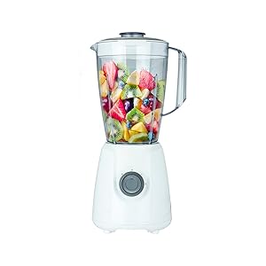 white status blender ready to mix fruit inside it&amp;amp;#39;s container