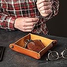 Taking off watch and putting it in tray