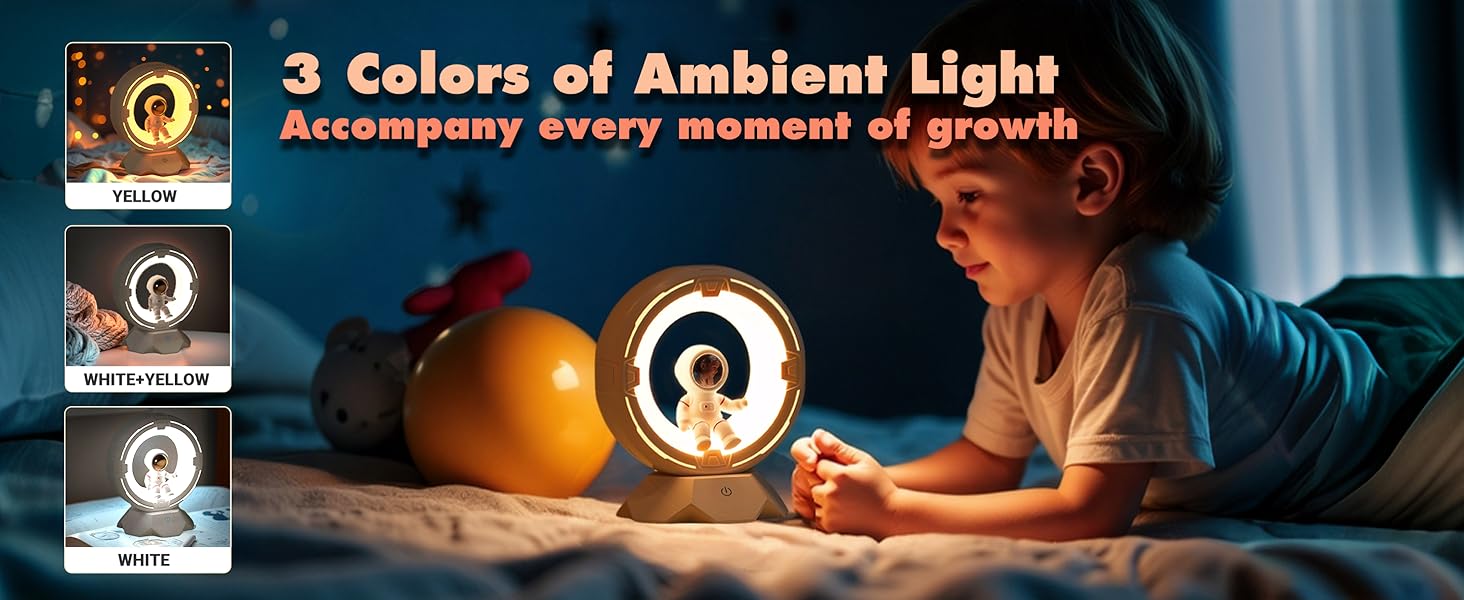 Circular ambient light with astronaut figure, featuring three color modes: yellow, white+yellow, and white. Child shown using light in dimly lit bedroom setting.