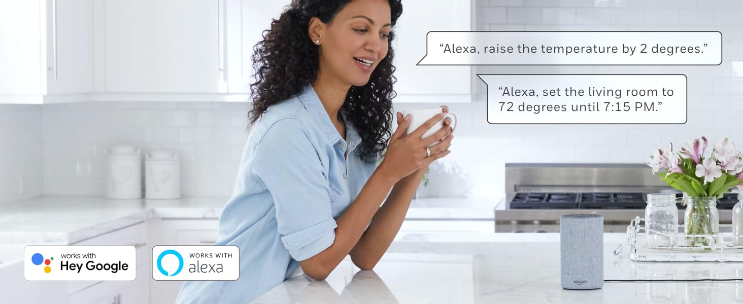 Woman speaking to Alexa in kitchen